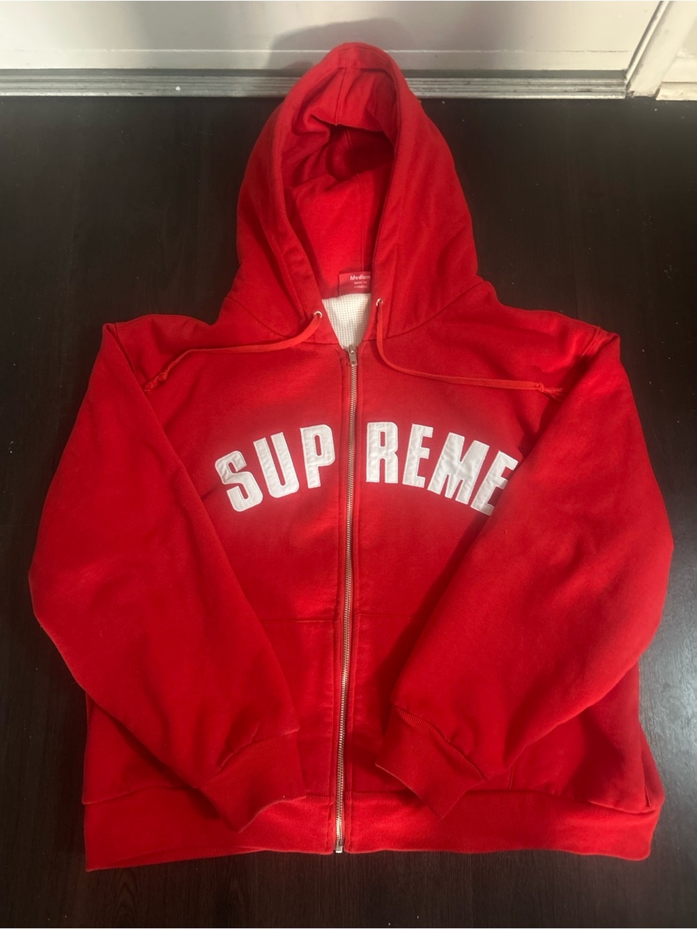 Supreme Red Hoodie with White Inner Label